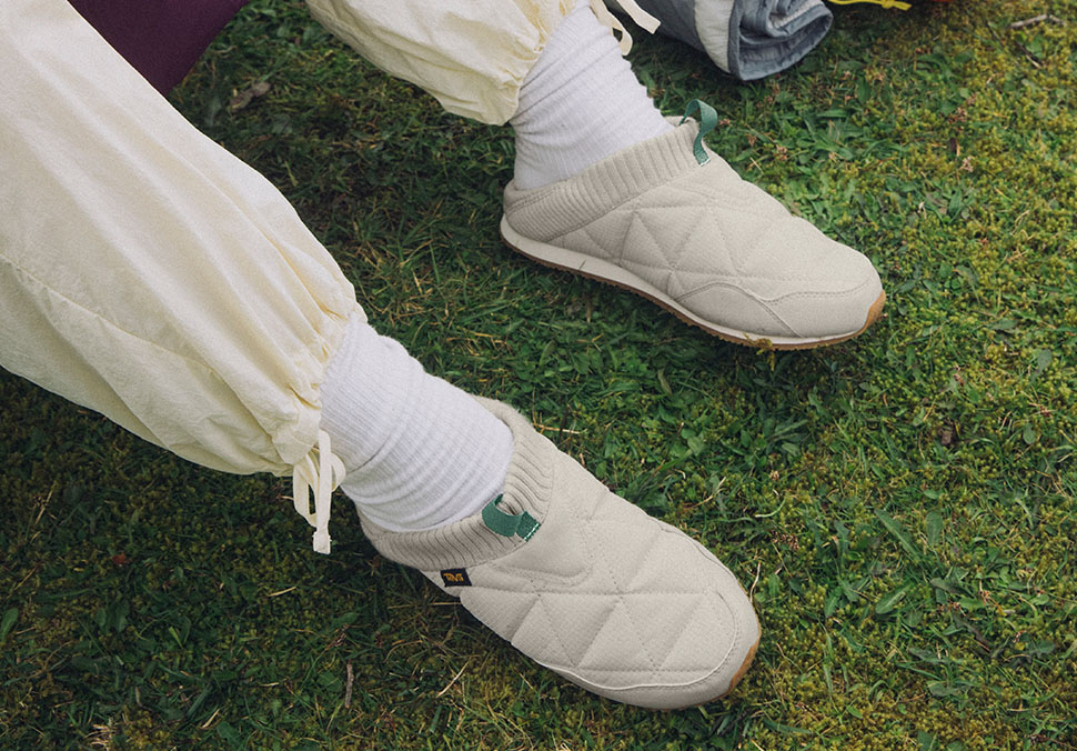 Close up of someone's feet wearing Teva 'ReEmber' shoes.