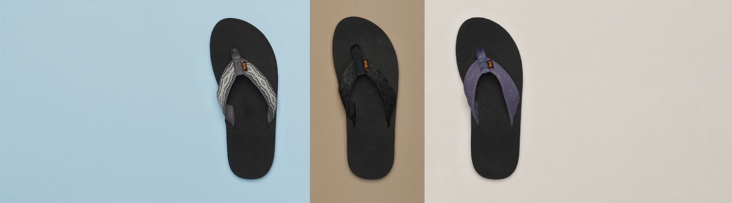 Teva flip flops against a colorful background.